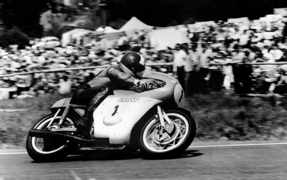 (Files) A picture taken on July 4, 1971 shows 500cc Motorcycle World Champion Giacomo Agostini from Italy riding his Agusta 500cc  in Spa Francorchamps where he won the 4th Belgium Grand Prix.  (Photo credit should read -/AFP/Getty Images)