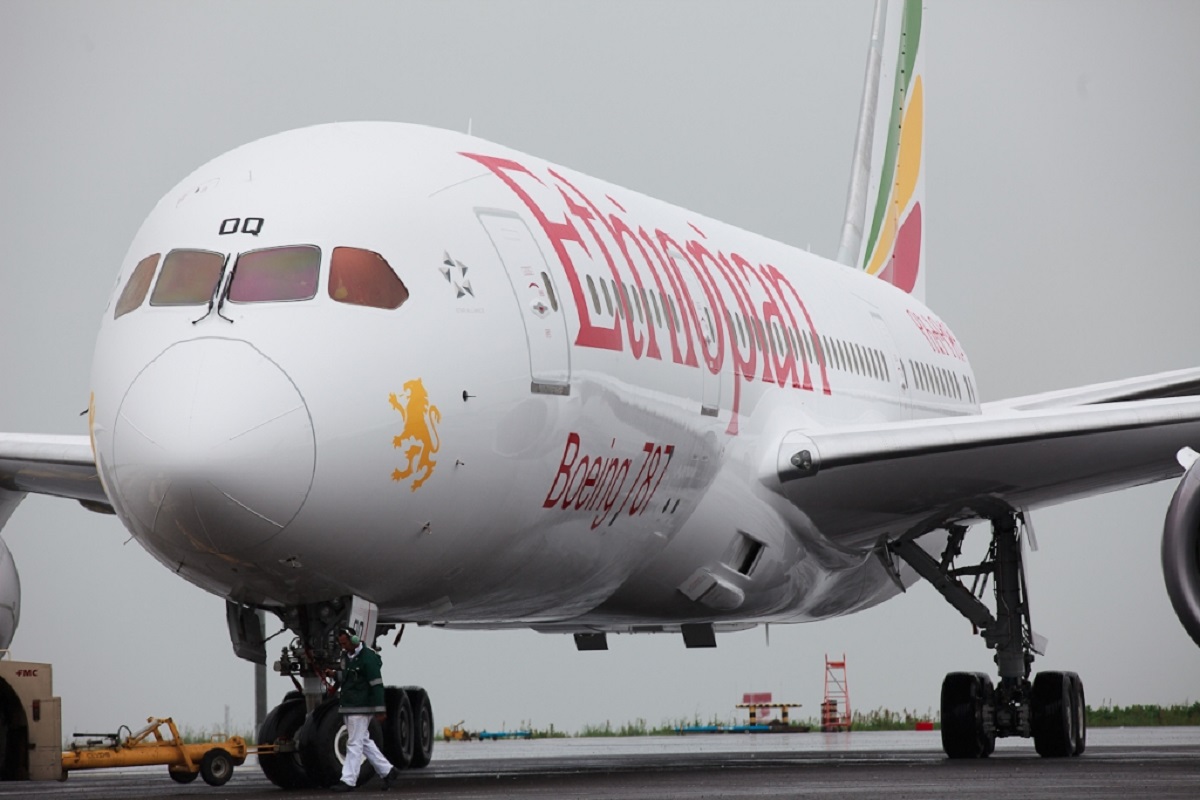 The first Ethiopian 787 Dreamliner is pulled into its parking spot prior to a VIP flight to Mt Kilimanjaro.  note the new titles.